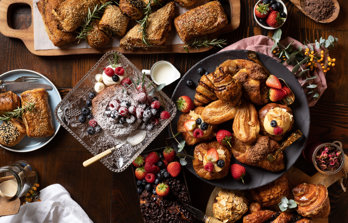 Trays full of freshly baked pastries & delicious cakes